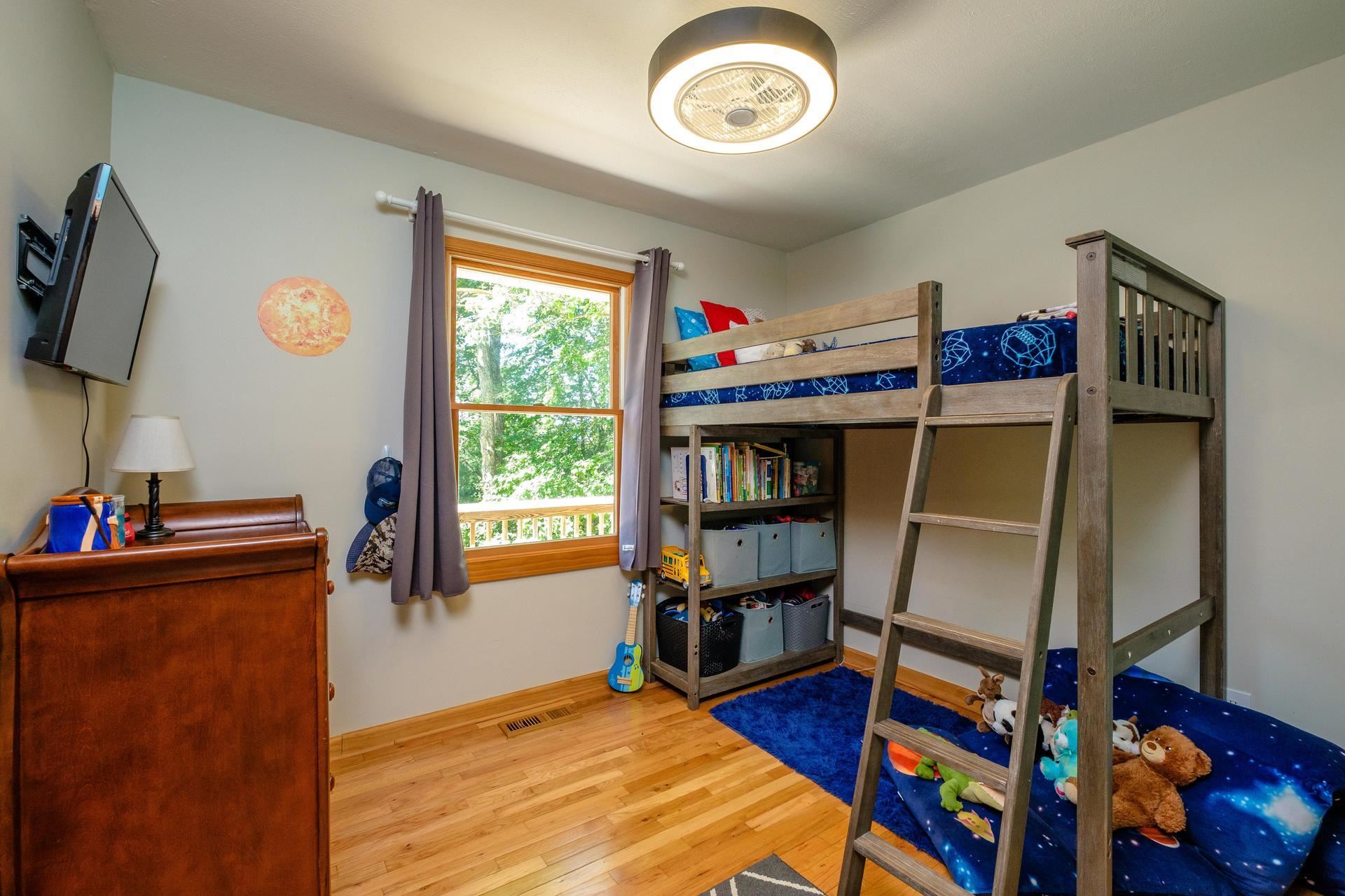 577 Union Church Road Churchville, VA 24421 - Photo 12 of 35 a bed room with a bed and a window