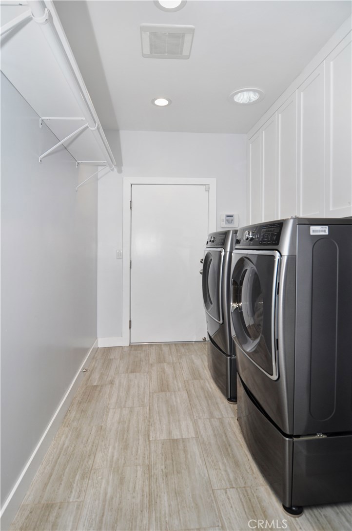 2339 Westminster Avenue Costa Mesa, CA 92627 - Photo 25 of 36 a view of walk in closet with clothes and shoes