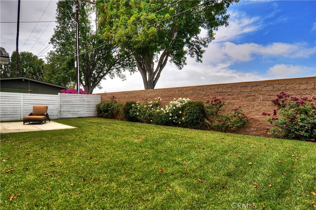2339 Westminster Avenue Costa Mesa, CA 92627 - Photo 28 of 36 a view of a terrace with a yard