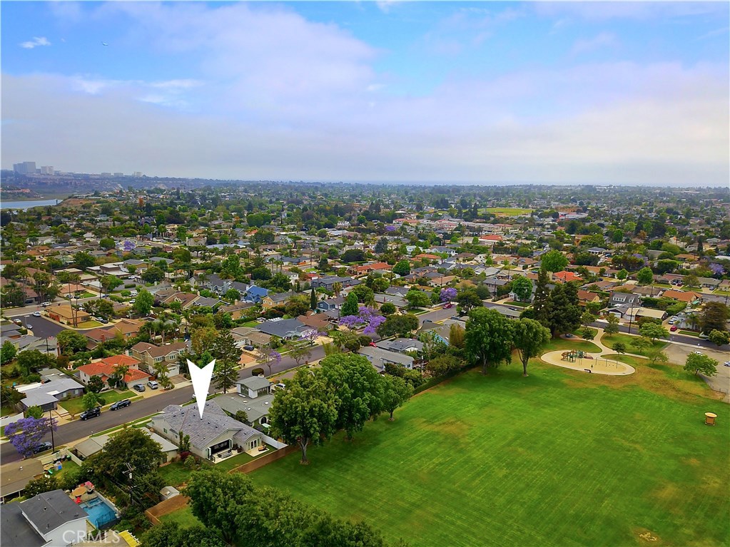 2339 Westminster Avenue Costa Mesa, CA 92627 - Photo 34 of 36 an aerial view of residential houses with outdoor space and trees