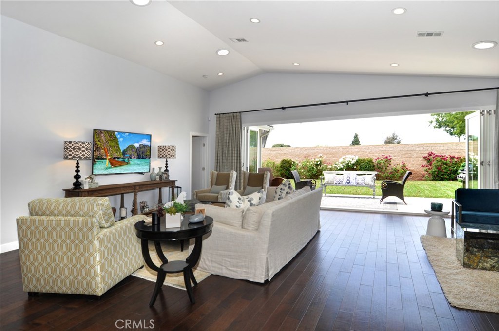 2339 Westminster Avenue Costa Mesa, CA 92627 - Photo 3 of 36 a living room with furniture and a large window