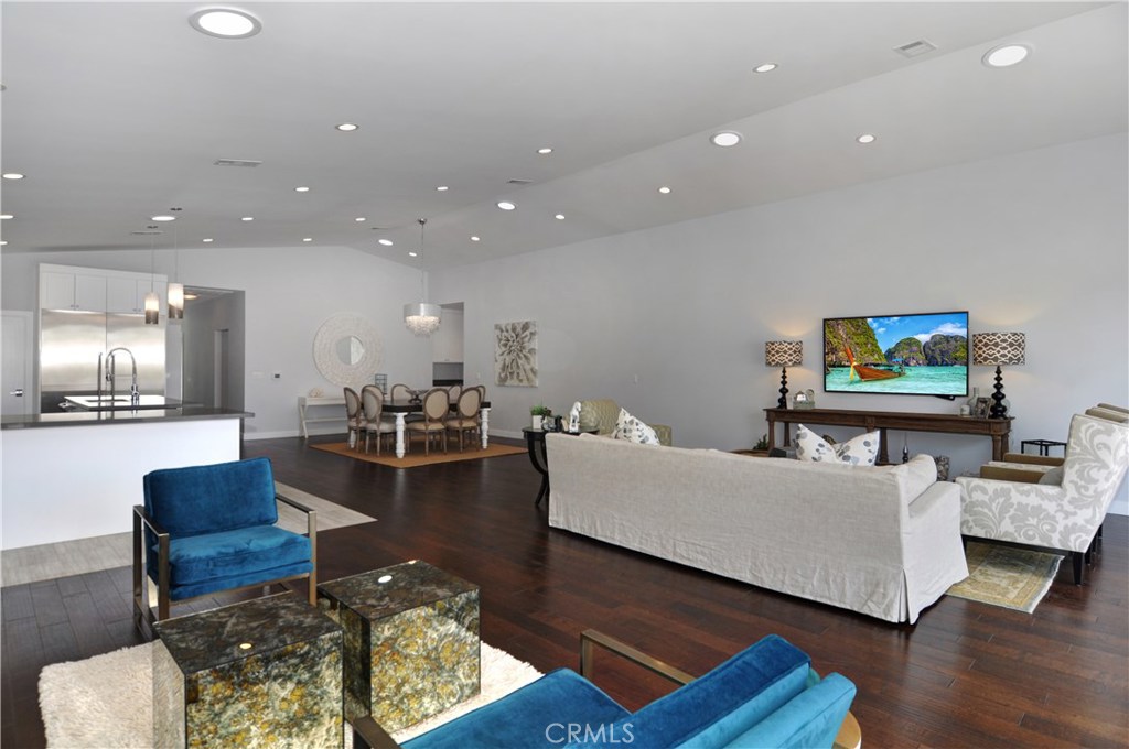 2339 Westminster Avenue Costa Mesa, CA 92627 - Photo 8 of 36 a living room with furniture and a flat screen tv