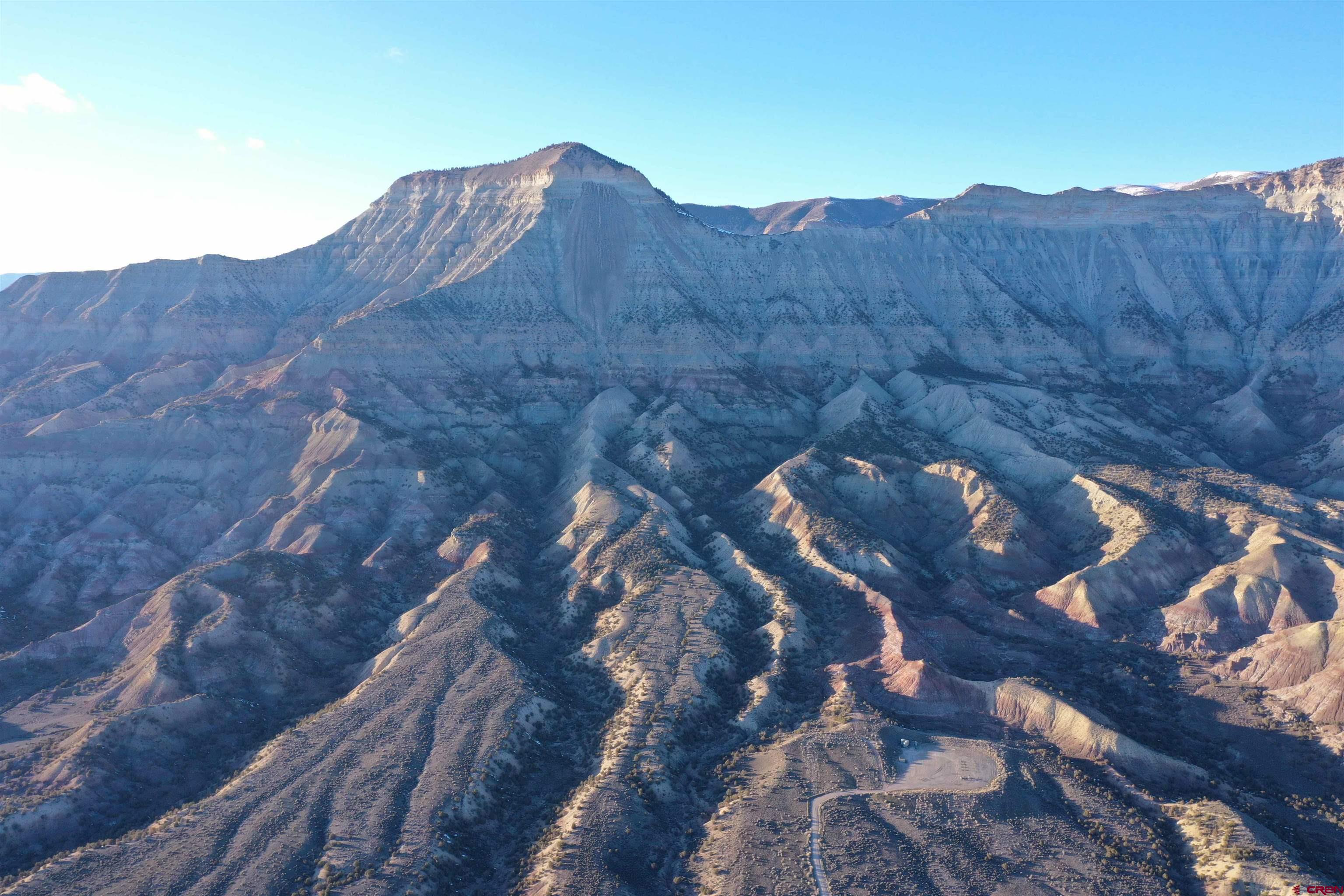 Tbd Highway 6&24 De Beque, CO 81635 - Photo 8 of 14 a view of a tree in a field