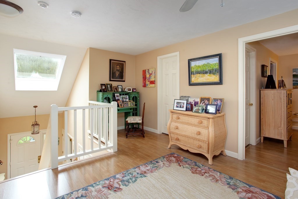 10 Kettle Lane, Unit 10 Mashpee, MA 02649 - Photo 15 of 31 a bed room with a bed and a window