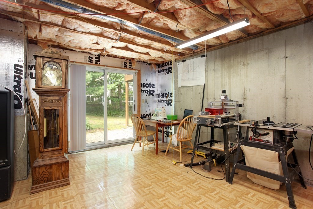 10 Kettle Lane, Unit 10 Mashpee, MA 02649 - Photo 22 of 31 a view of a chairs and table in a room