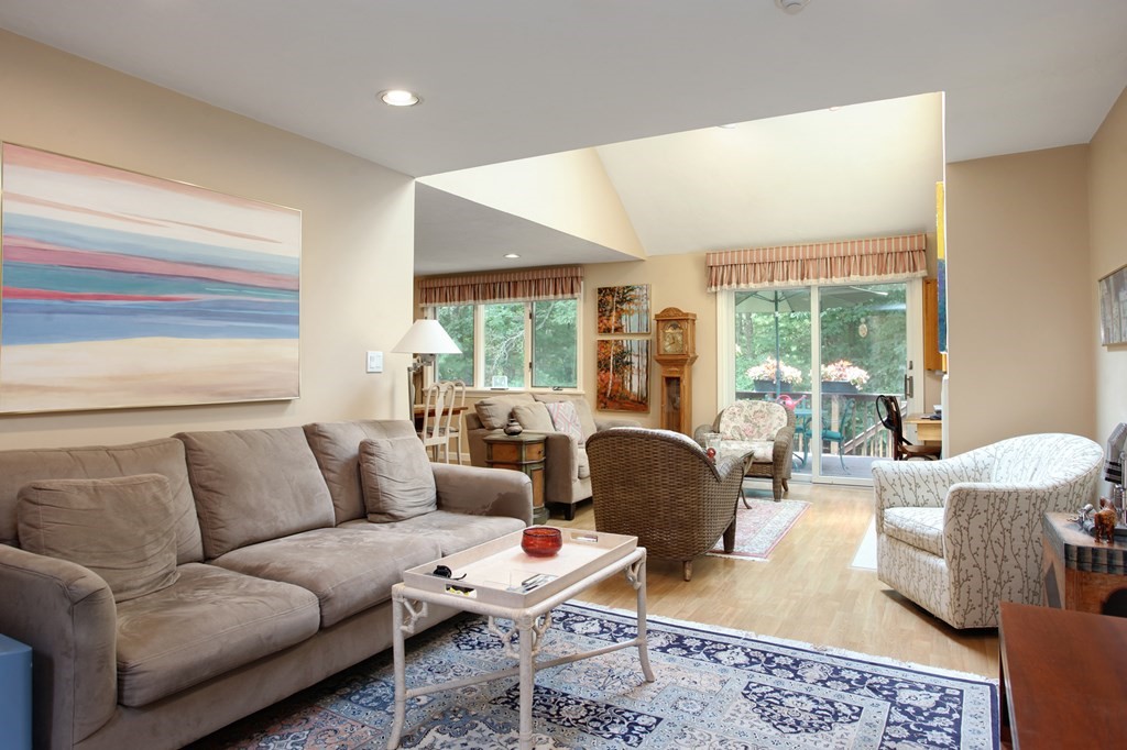 10 Kettle Lane, Unit 10 Mashpee, MA 02649 - Photo 6 of 31 a living room with furniture and a large window