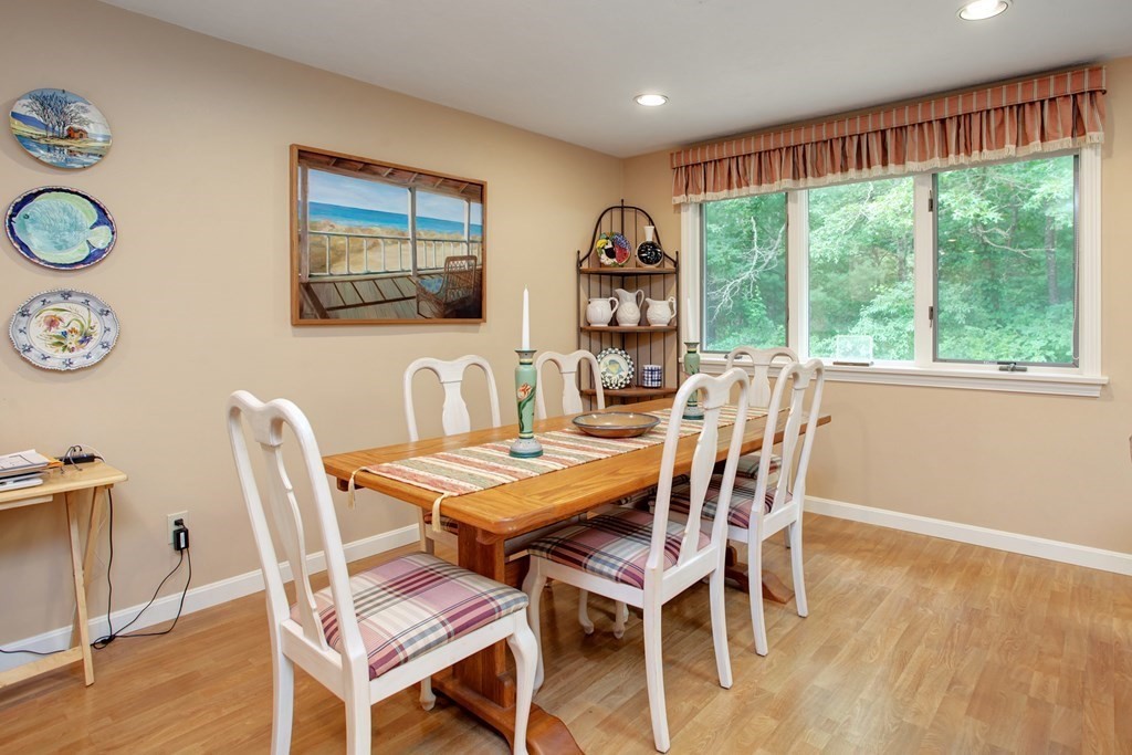 10 Kettle Lane, Unit 10 Mashpee, MA 02649 - Photo 10 of 31 a dining room with furniture and window