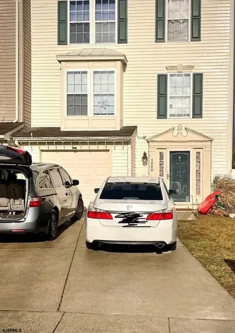a car parked in front of a house