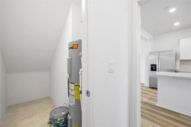 a bathroom with a sink toilet and mirror