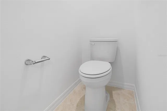a view of a bathroom with a glass shower door