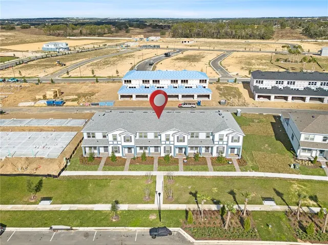 a view of residential houses with lake view and mountain view