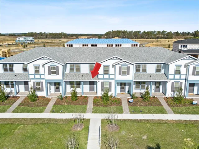 a view of a city with an ocean view