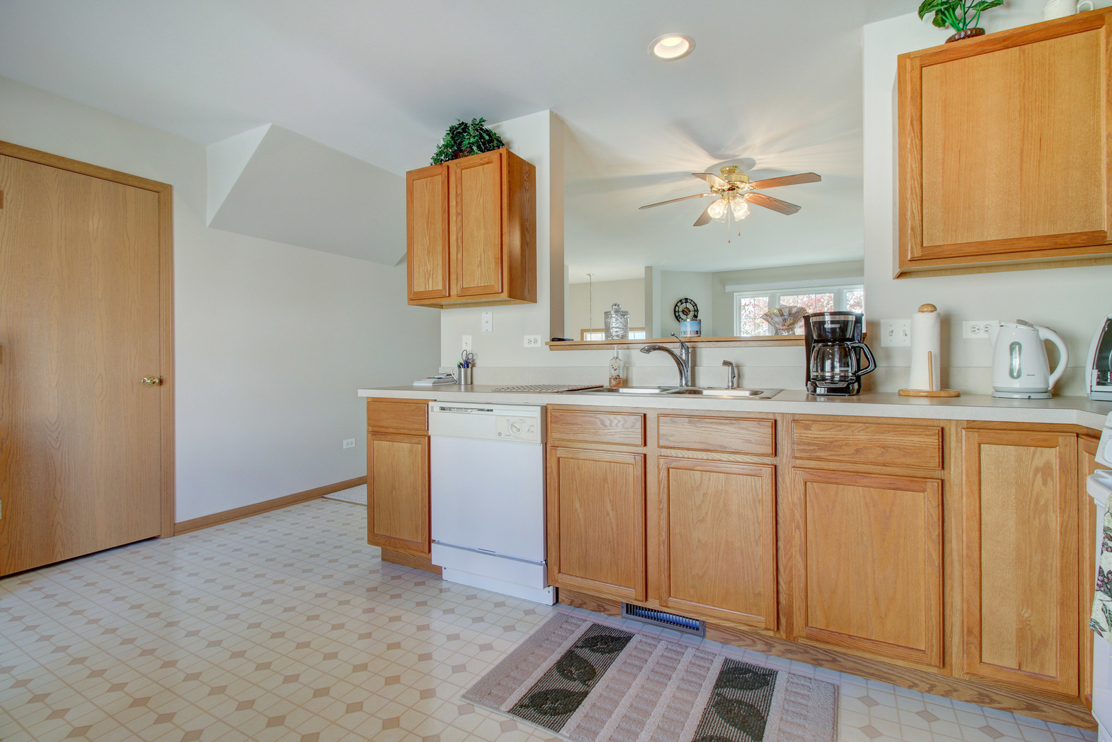 34295 North Barberry Road Round Lake, IL 60073 - Photo 14 of 23 a bathroom with a sink vanity and mirror