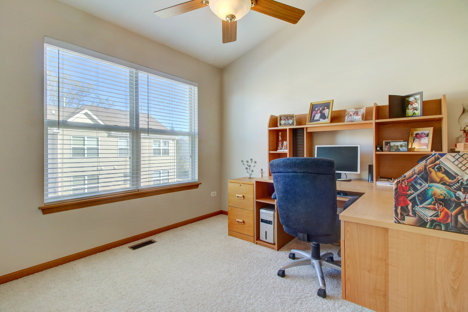 34295 North Barberry Road Round Lake, IL 60073 - Photo 15 of 23 a view of a workspace with furniture and a window