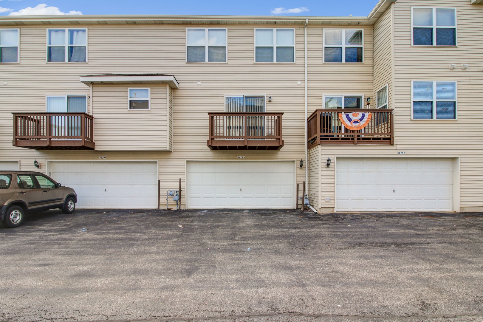 34295 North Barberry Road Round Lake, IL 60073 - Photo 5 of 23 a view of building with car parked