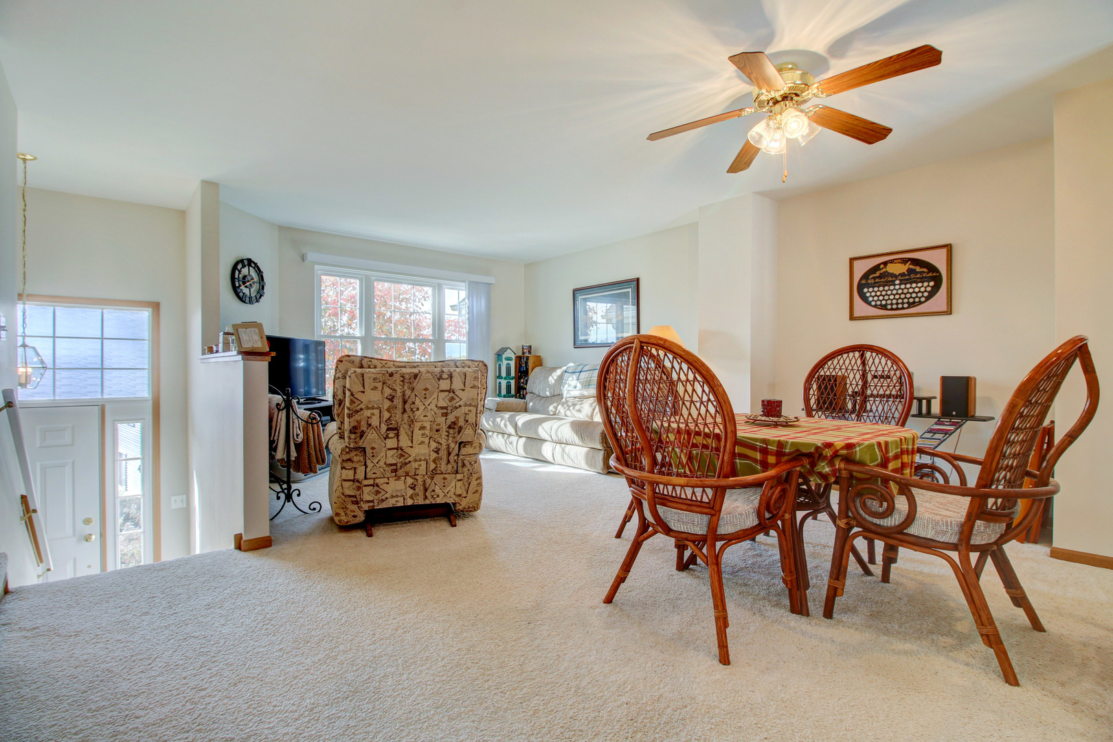 34295 North Barberry Road Round Lake, IL 60073 - Photo 7 of 23 a view of a dining room with furniture and chandelier