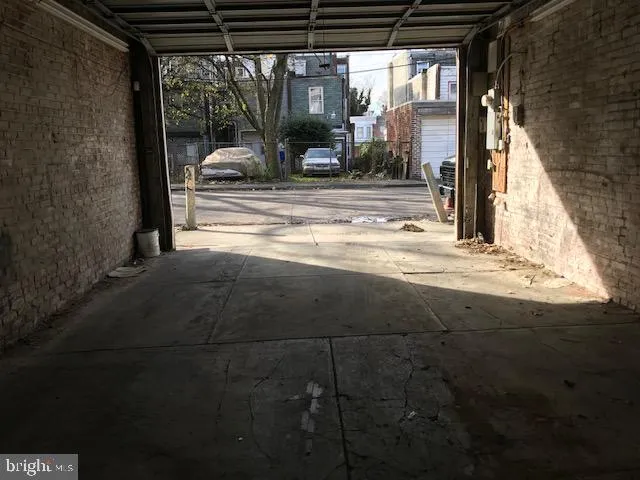 a view of parking area and porch