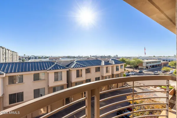 a view of a building from a balcony