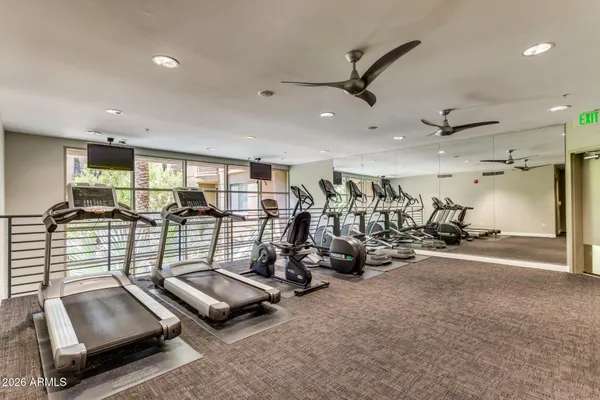 a view of a room with gym equipment
