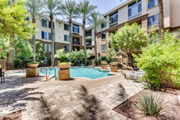 a bench is sitting in front of building