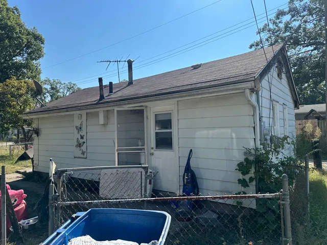 a view of house with outdoor space