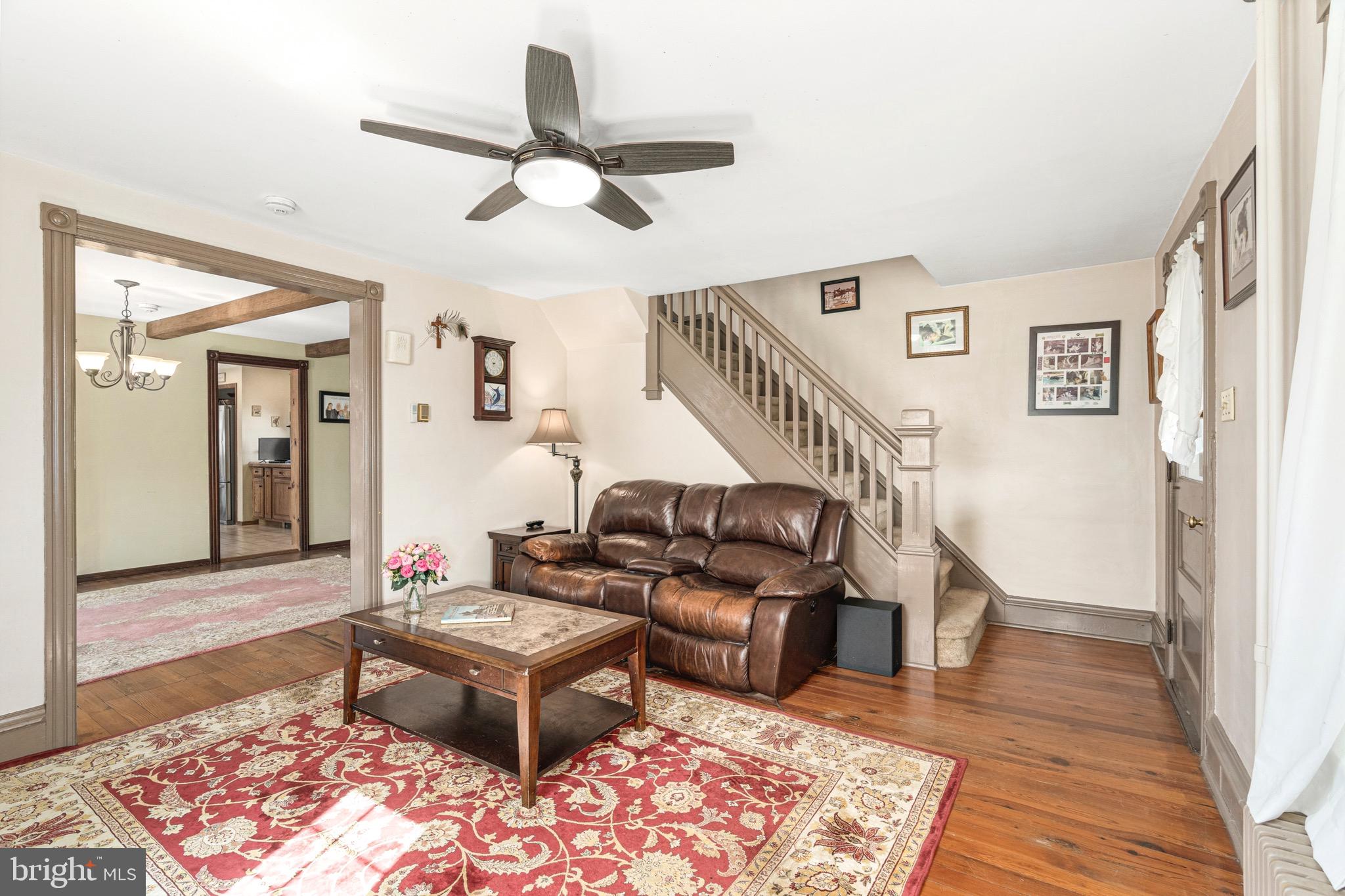 401 Easton Road Riegelsville, PA 18077 - Photo 10 of 27 a living room with furniture and a rug