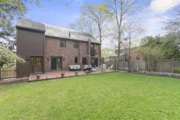 101 Stuart Road Newton, MA 02459 - Photo 2 of 26 a view of a house with backyard and sitting area
