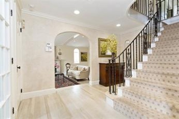 101 Stuart Road Newton, MA 02459 - Photo 3 of 26 a view of entryway and hall with wooden floor