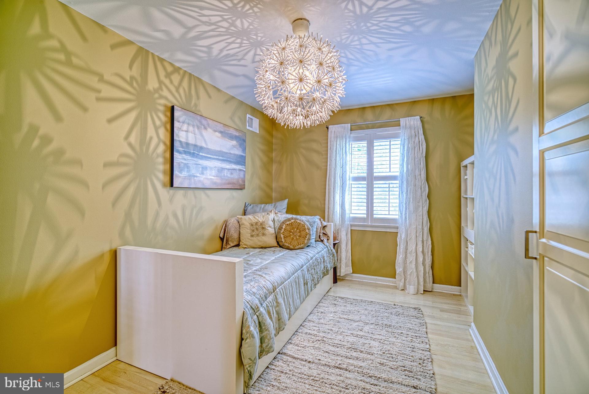 6745 Towne Lane Road McLean, VA 22101 - Photo 17 of 37 Bright, cheerful guest room, built-in organizers