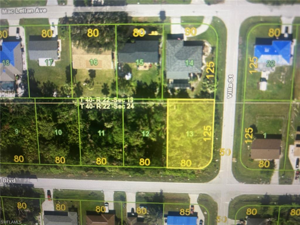 a couple of table and chair in a yard