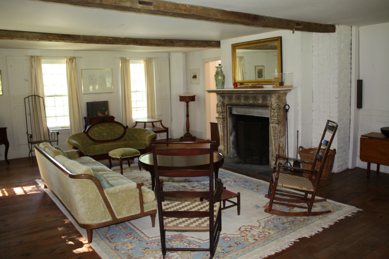13 Main Road Tyringham, MA 01238 - Photo 3 of 31 a living room with furniture and a fireplace