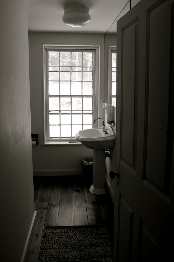 13 Main Road Tyringham, MA 01238 - Photo 26 of 31 a bathroom with a sink a toilet and a window