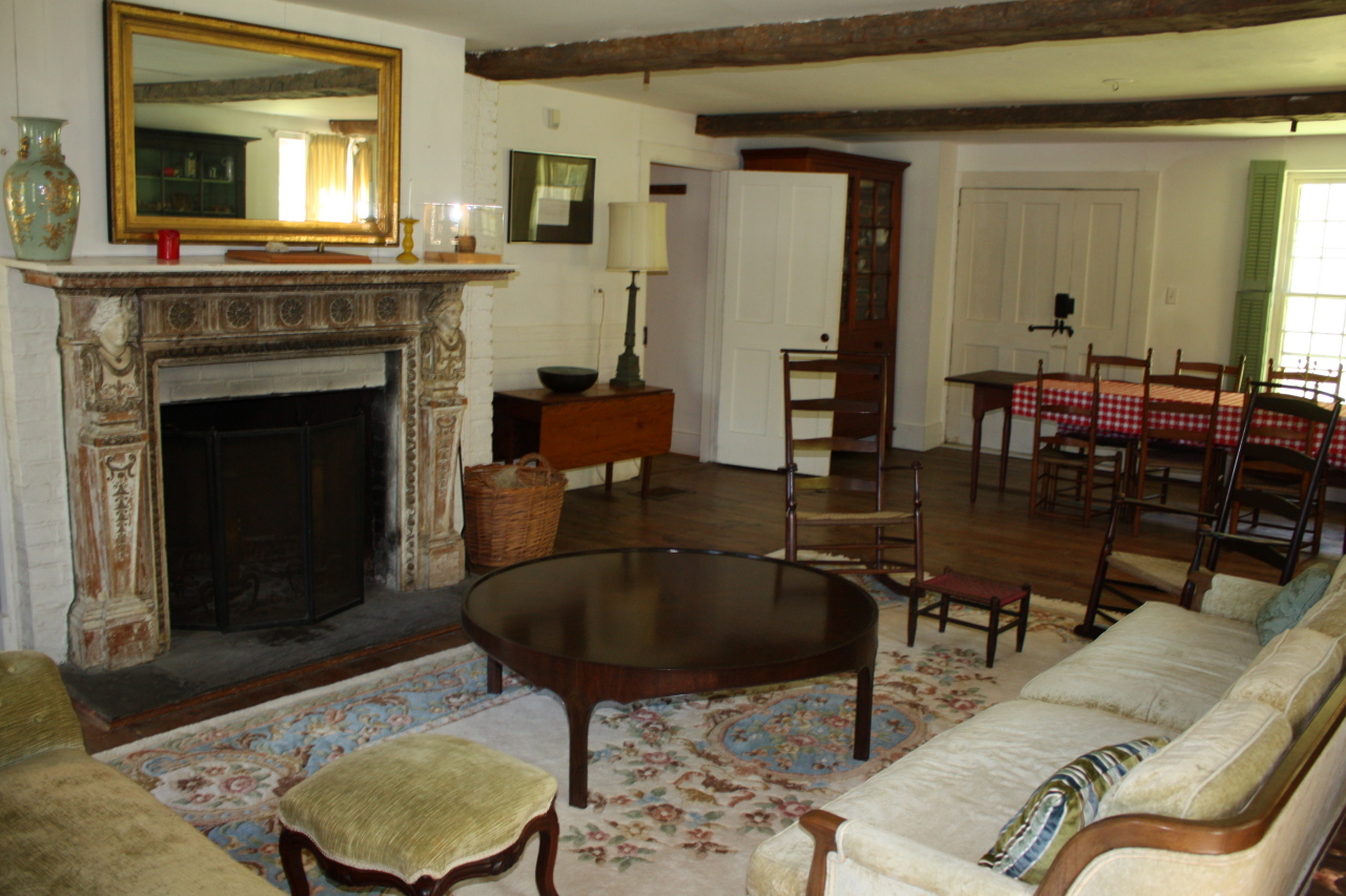 13 Main Road Tyringham, MA 01238 - Photo 4 of 31 a living room with furniture and a fireplace