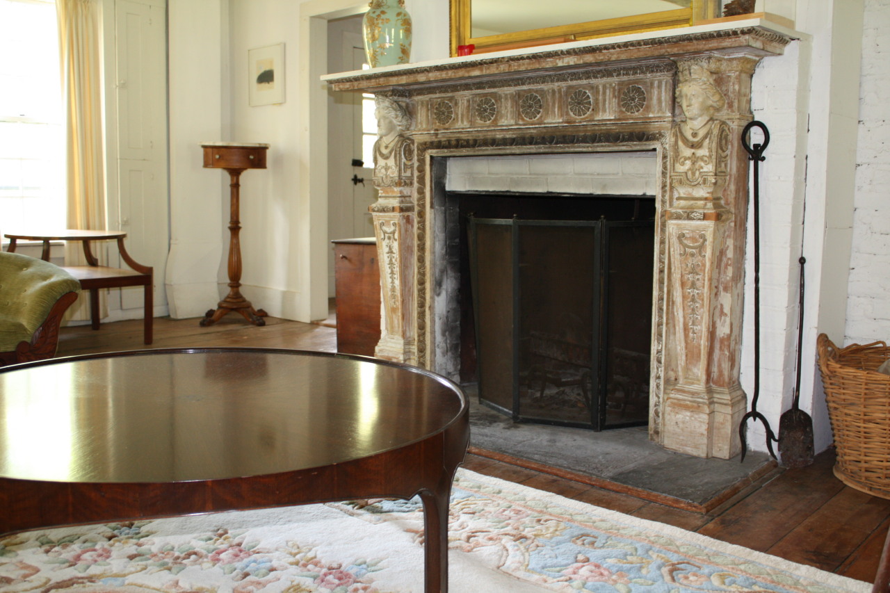 13 Main Road Tyringham, MA 01238 - Photo 6 of 31 a view of a living room with a fireplace