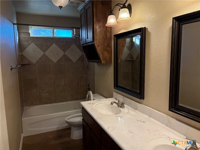a utility room with cabinets