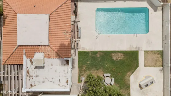 with aerial view of a house with a garden