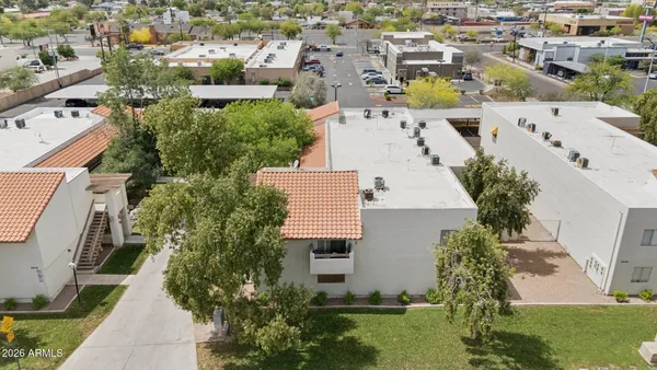 an aerial view of a house with a garden