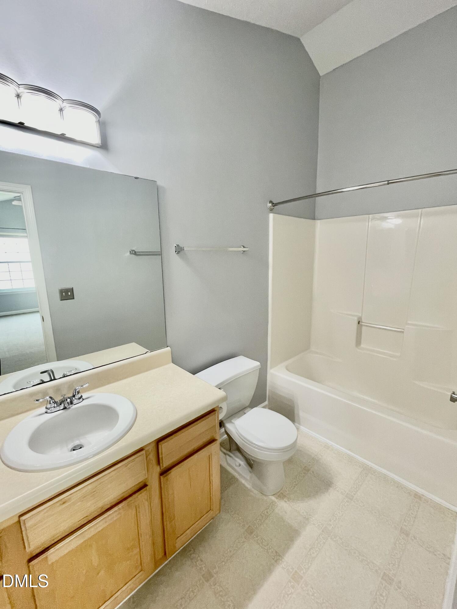 5428 Roan Mountain Place Raleigh, NC 27613 - Photo 18 of 22 Spacious full bath open to the bedroom/bonus room gives plenty of flexibility of living choice.