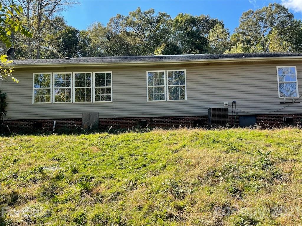 175 Balmy Lane Rutherfordton, NC 28139 - Photo 3 of 10 a house view with a garden space