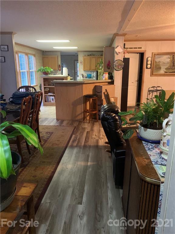 175 Balmy Lane Rutherfordton, NC 28139 - Photo 6 of 10 a kitchen with stainless steel appliances granite countertop a stove top oven a sink and dishwasher