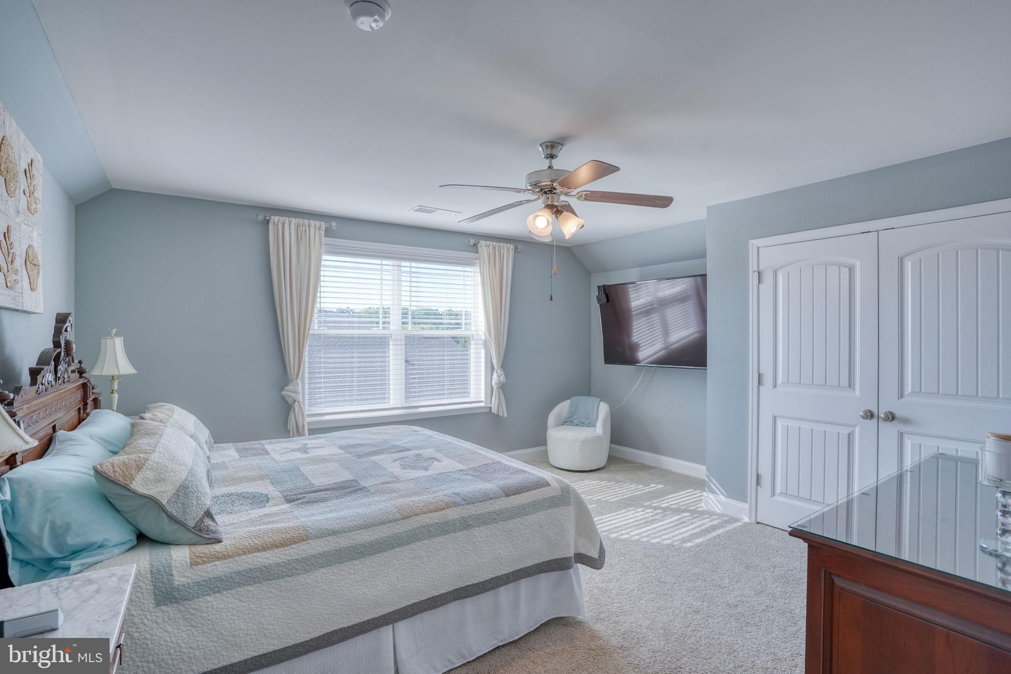 15272 Crape Myrtle Road Milton, DE 19968 - Photo 53 of 61 Serene bedroom with soft blue tones.
