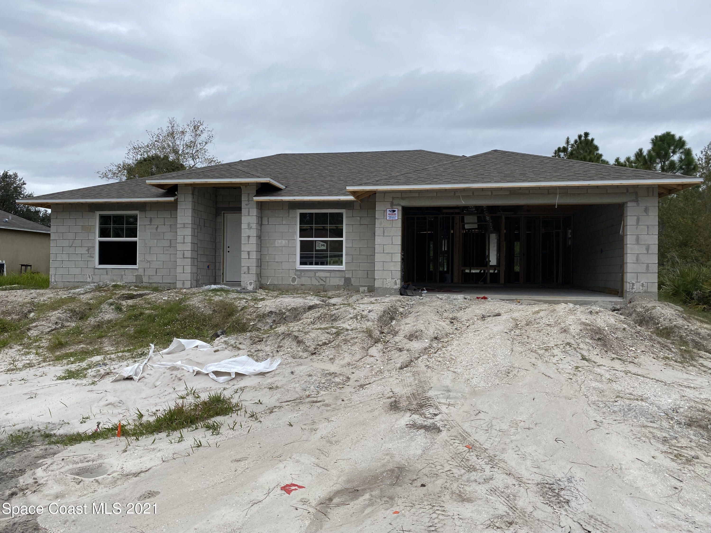 1275 Ragen Road Southeast Palm Bay, FL 32909 - Photo 2 of 12 Front Of Home