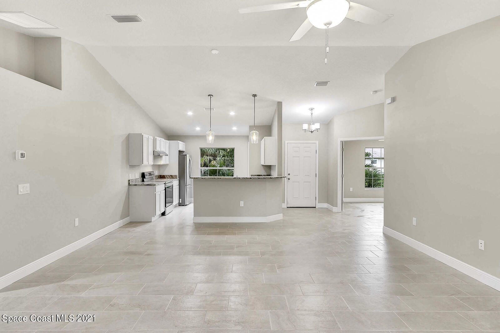 1275 Ragen Road Southeast Palm Bay, FL 32909 - Photo 4 of 12 Kitchen and Great Room