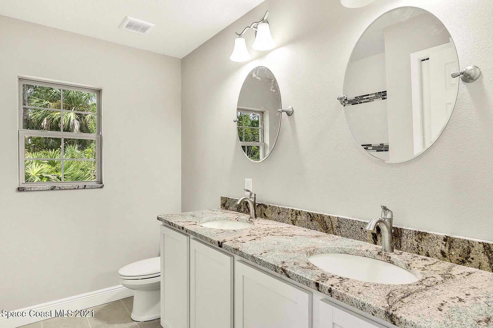 1275 Ragen Road Southeast Palm Bay, FL 32909 - Photo 9 of 12 Guest Bath 1