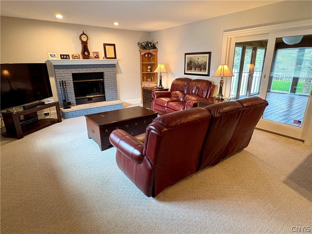 7892 East Ridge Pointe Drive Manlius, NY 13066 - Photo 15 of 46 Cozy fireplace in the family room.