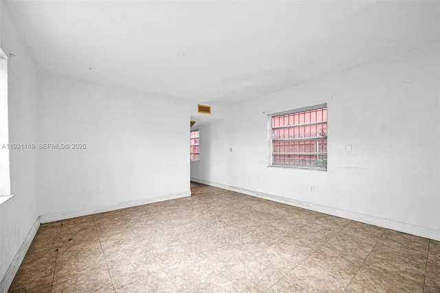 an empty room with windows