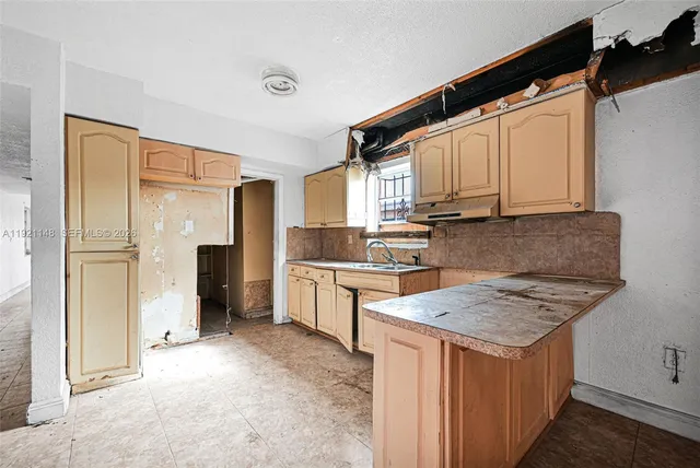 a bathroom with a sink and a bathtub