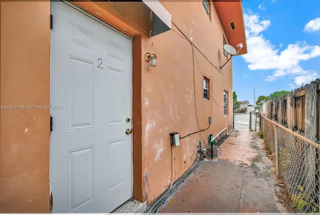 a bathroom with a toilet a sink and bathtub
