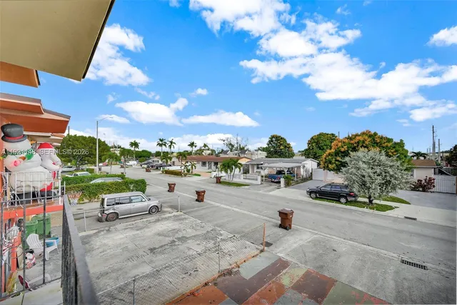 a view of a big room with closet and chandelier fan