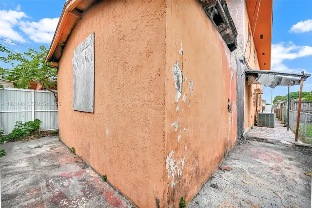 a view of a pathway of a building along with stairs
